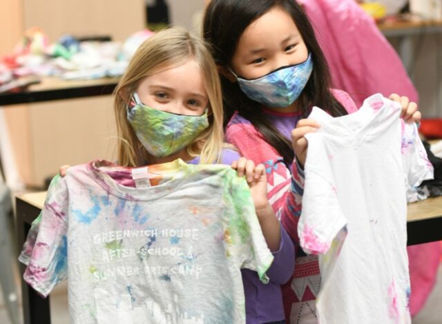 Portrait of two young girls with t-shirts