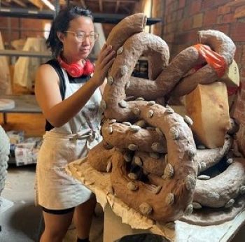 Greenwich House Pottery Fellowship Artist Cathy Lu works on a new project, American Dream Pillows